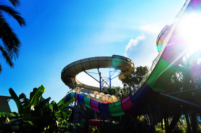 Low angle view of ferris wheel against sky