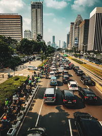 High angle view of cars on road in city