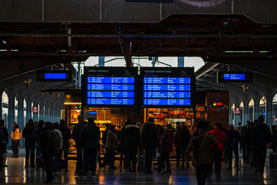 Rear view of people at airport