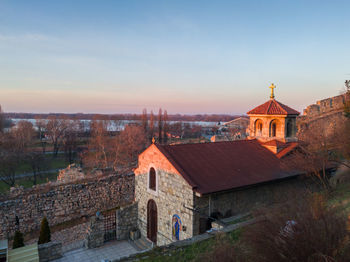 High angle view of buildings in city against sky