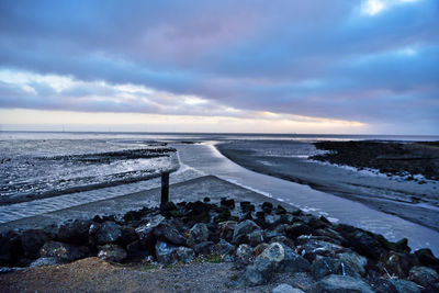 Scenic view of sea against sky during sunset