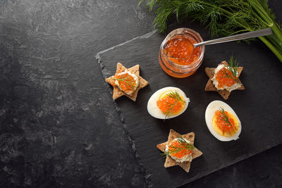 High angle view of orange fruits on table