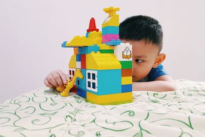 Boy playing with airplane