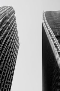 Low angle view of modern buildings against clear sky