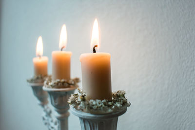 Close-up of burning candle