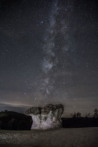 Scenic view of star field against sky at night