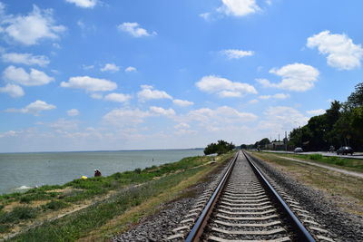 View of road against cloudy sky