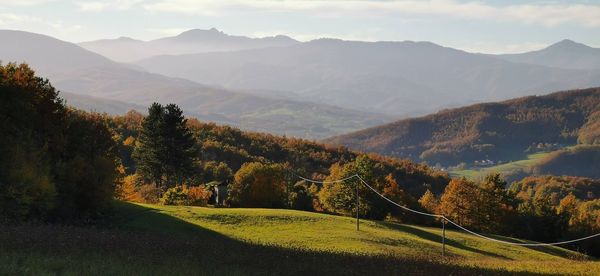 Scenic view of field against mountains