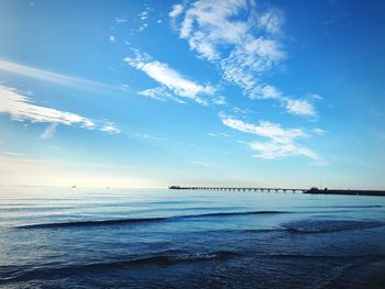 Scenic view of sea against blue sky