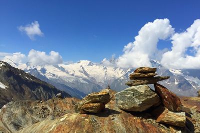 Panoramic view of rocks and mountains against sky