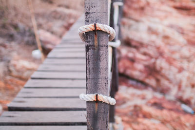 Close-up of rusty metal on wood