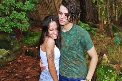 Young couple standing outdoors
