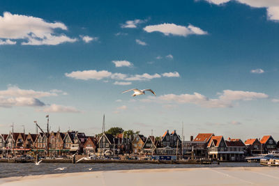 View of city against cloudy sky