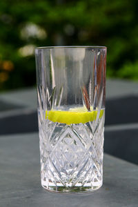 Close-up of glass of gin on table