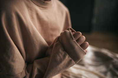 Close-up of man holding hands