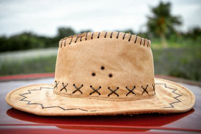 Close-up of hat on car