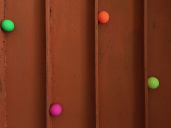 Close-up of multi colored ball on wall