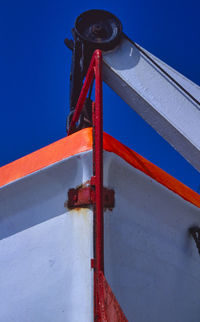 Metallic structure against clear blue sky