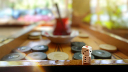 Close-up of dices on table