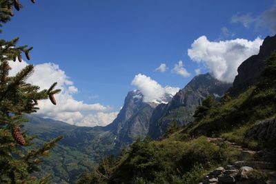 Scenic view of eiger against cloudy sky