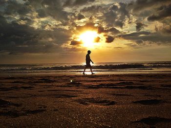 Silhouette of people on beach