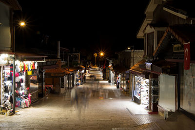 Illuminated street at night