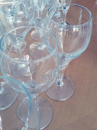 Close-up of wine glasses on table