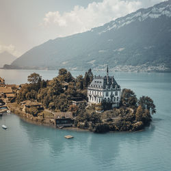 View of church on island in lake