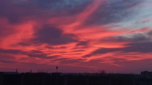 Scenic view of dramatic sky during sunset