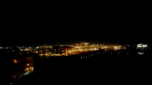 Illuminated cityscape at night