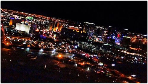 Illuminated cityscape at night