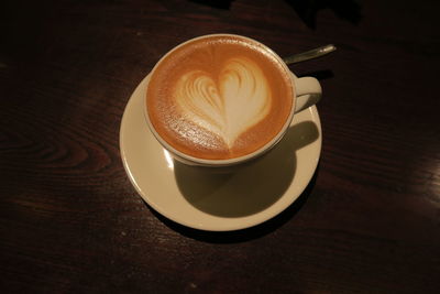 High angle view of cappuccino on table