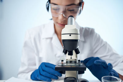 Scientist examining chemical in laboratory