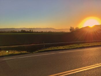 Scenic view of landscape against sky during sunset