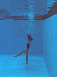 Woman swimming in pool