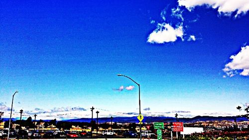 View of street light against blue sky