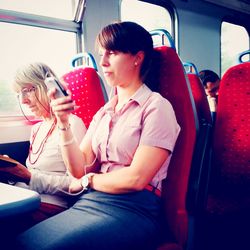 Woman sitting in train