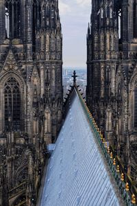 Low angle view of building against sky in city