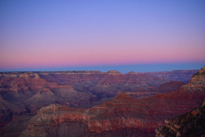 Scenic view of dramatic landscape during sunset