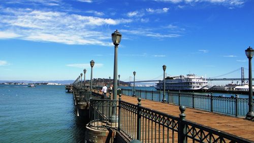 Pier on sea against sky