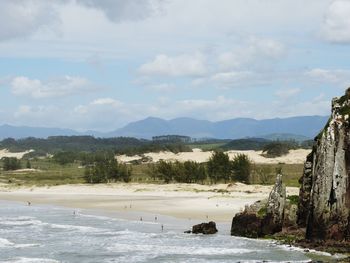 Scenic view of landscape and mountains against sky