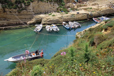 High angle view of boats moored in river