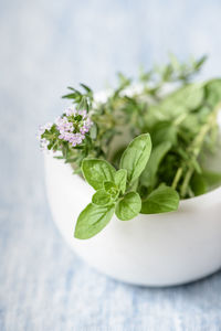 Close-up of leaves and flowers on table