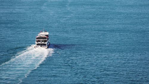 High angle view of ship sailing in sea