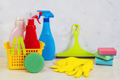 Multi colored bottles on shelf