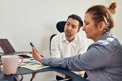 Business colleagues working at office