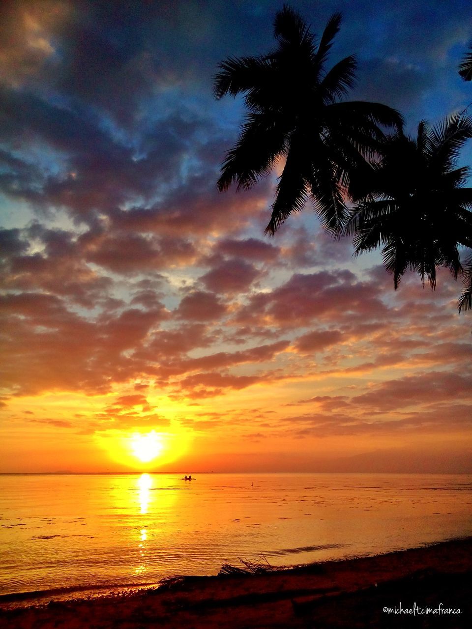 sunset, sea, horizon over water, sky, scenics, tranquil scene, beauty in nature, tranquility, water, cloud - sky, silhouette, beach, idyllic, orange color, nature, sun, palm tree, cloud, shore, tree