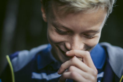 Close-up of boy smiling