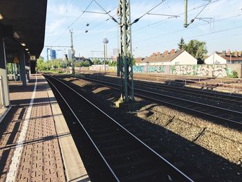 Railroad station platform against sky