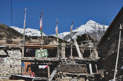 Built structure against clear sky during winter